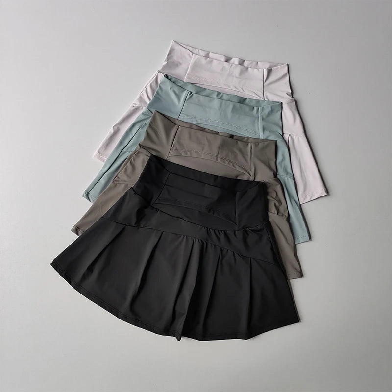 Falda Deportiva Plisada de Cintura Alta – Estilo Activo y Elegante