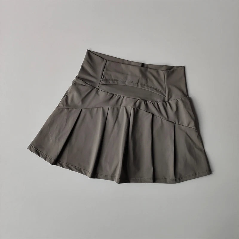 Falda Deportiva Plisada de Cintura Alta – Estilo Activo y Elegante